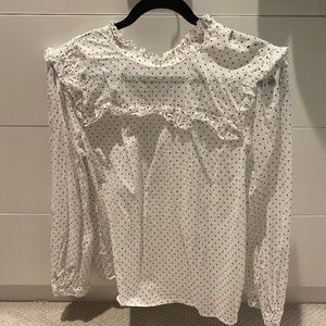 White with black polka dot blouse